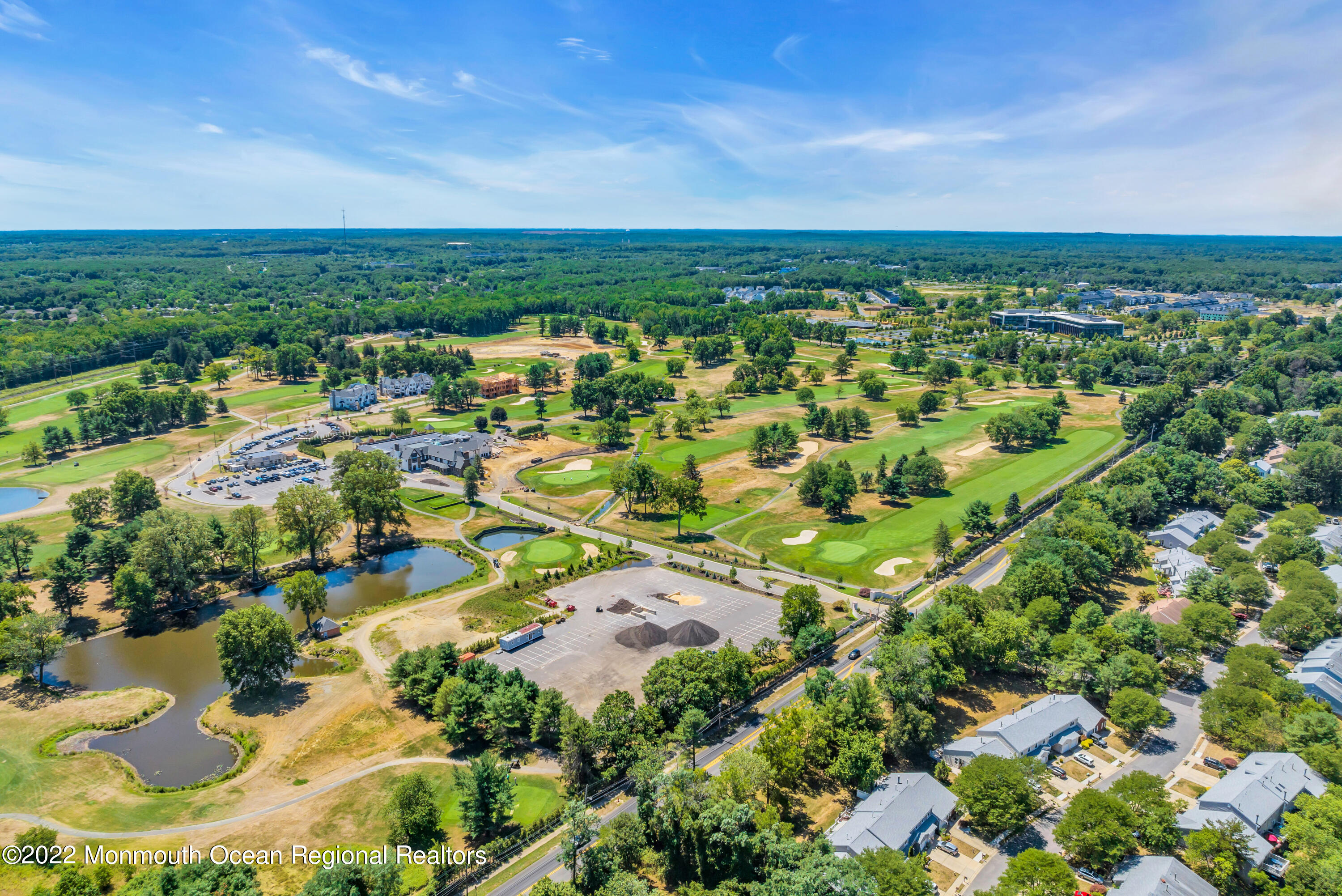 174 Eagle Way Eatontown, NJ 07724 - Photo 60 of 102 an aerial view of residential houses with outdoor space and trees