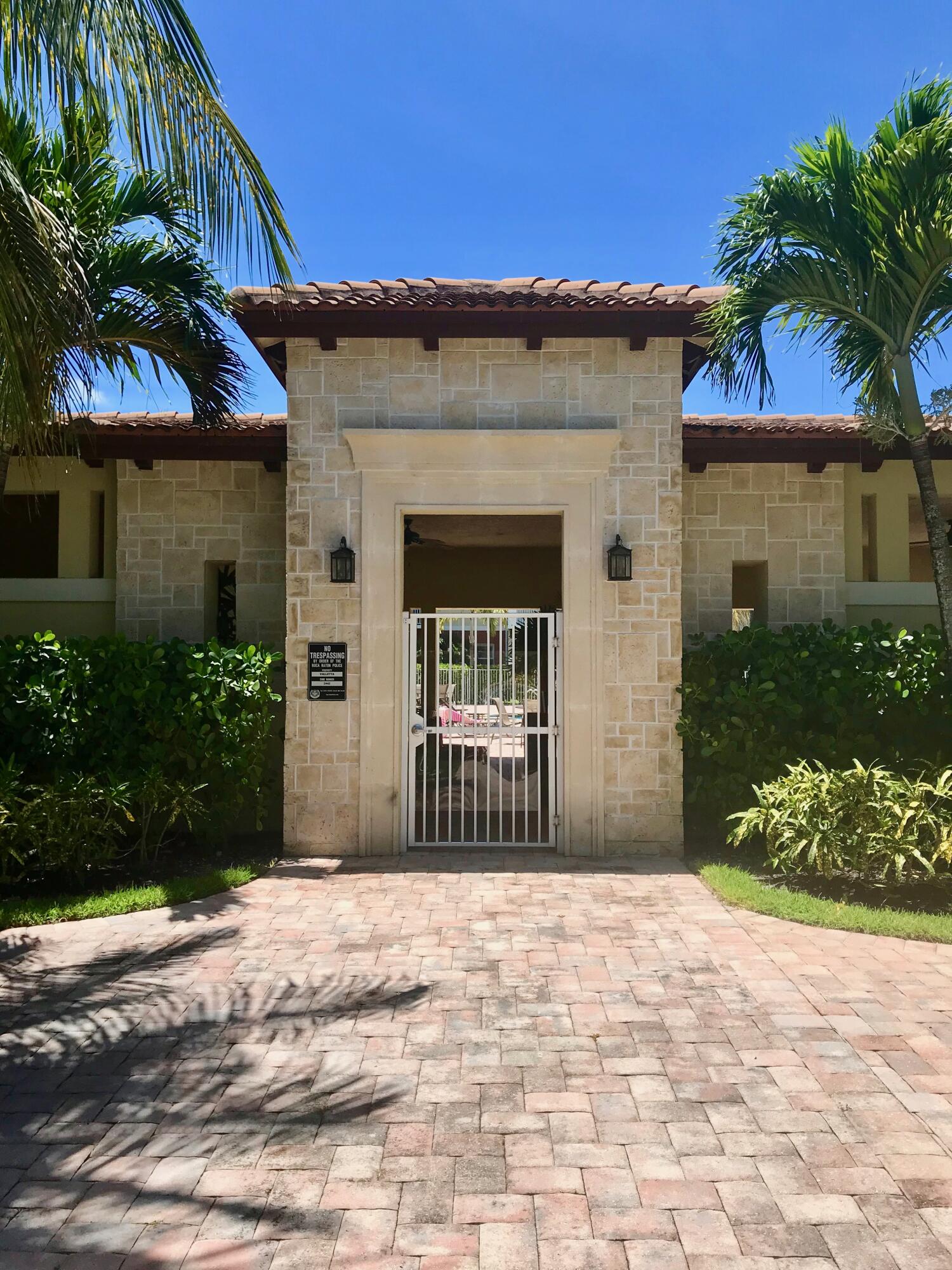 100 Northwest 69th Circle, Unit 13 Boca Raton, FL 33487 - Photo 36 of 45 entrance to pool area