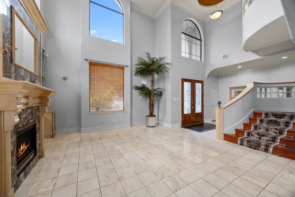a view of livingroom with furniture and a fireplace