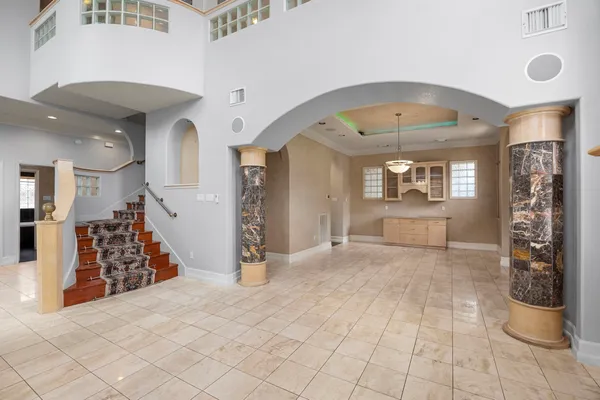 a view of livingroom with hardwood floor and hallway