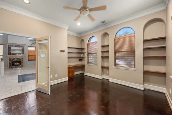 a view of an empty room with a window