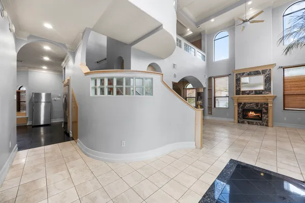 a view of living room with furniture and a flat screen tv