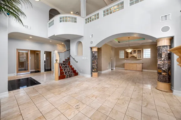 a view of a hallway with entryway