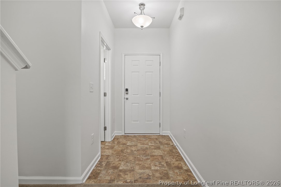 226 River Oak Street Spring Lake, NC 28390 - Photo 8 of 41 a view of hallway with wooden floor