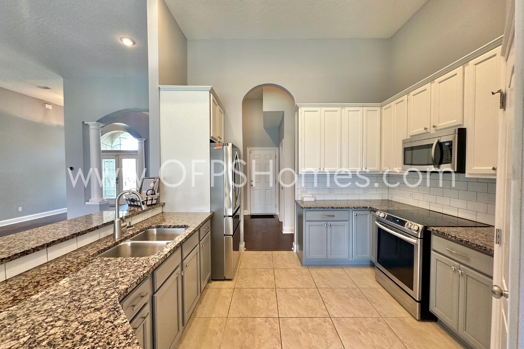 4611 Chanan Drive Crestview, FL 32539 - Photo 15 of 36 a kitchen with a stove oven and sink