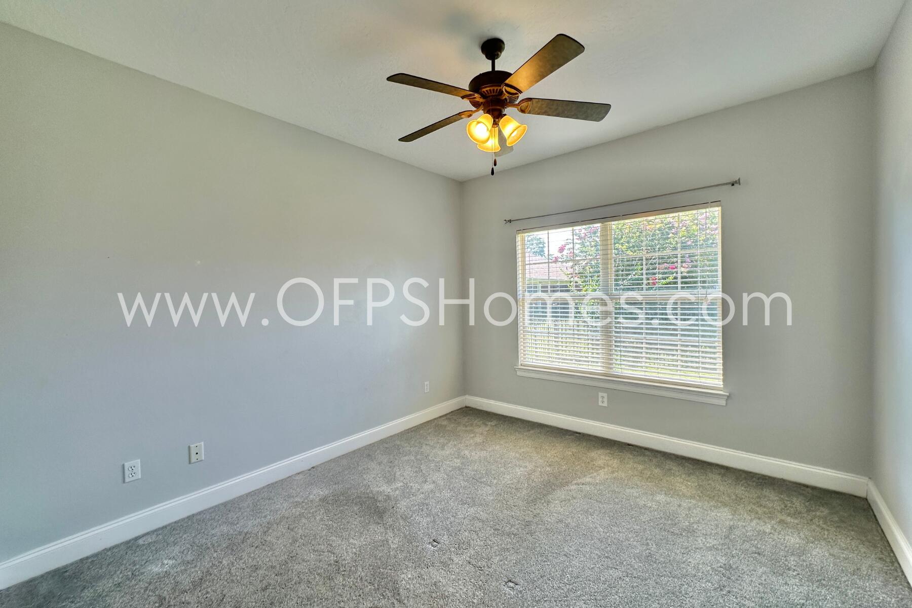 4611 Chanan Drive Crestview, FL 32539 - Photo 22 of 36 an empty room with a window