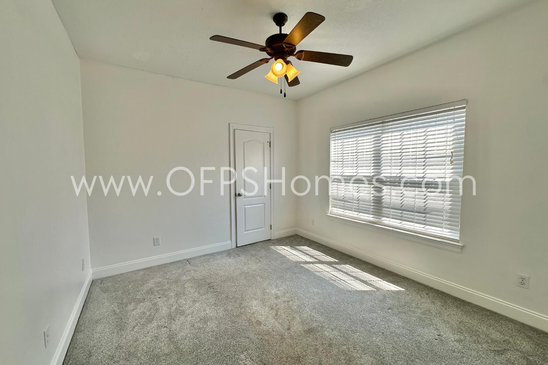 4611 Chanan Drive Crestview, FL 32539 - Photo 24 of 36 a view of an empty room with a window