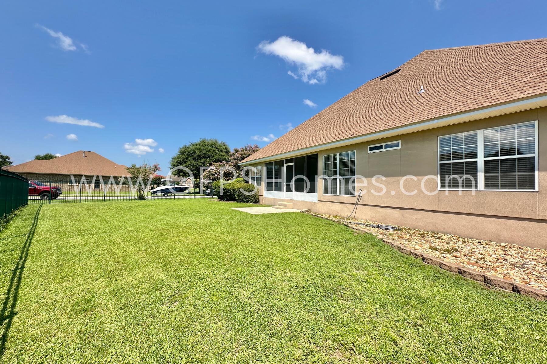 4611 Chanan Drive Crestview, FL 32539 - Photo 36 of 36 a front view of a house with garden
