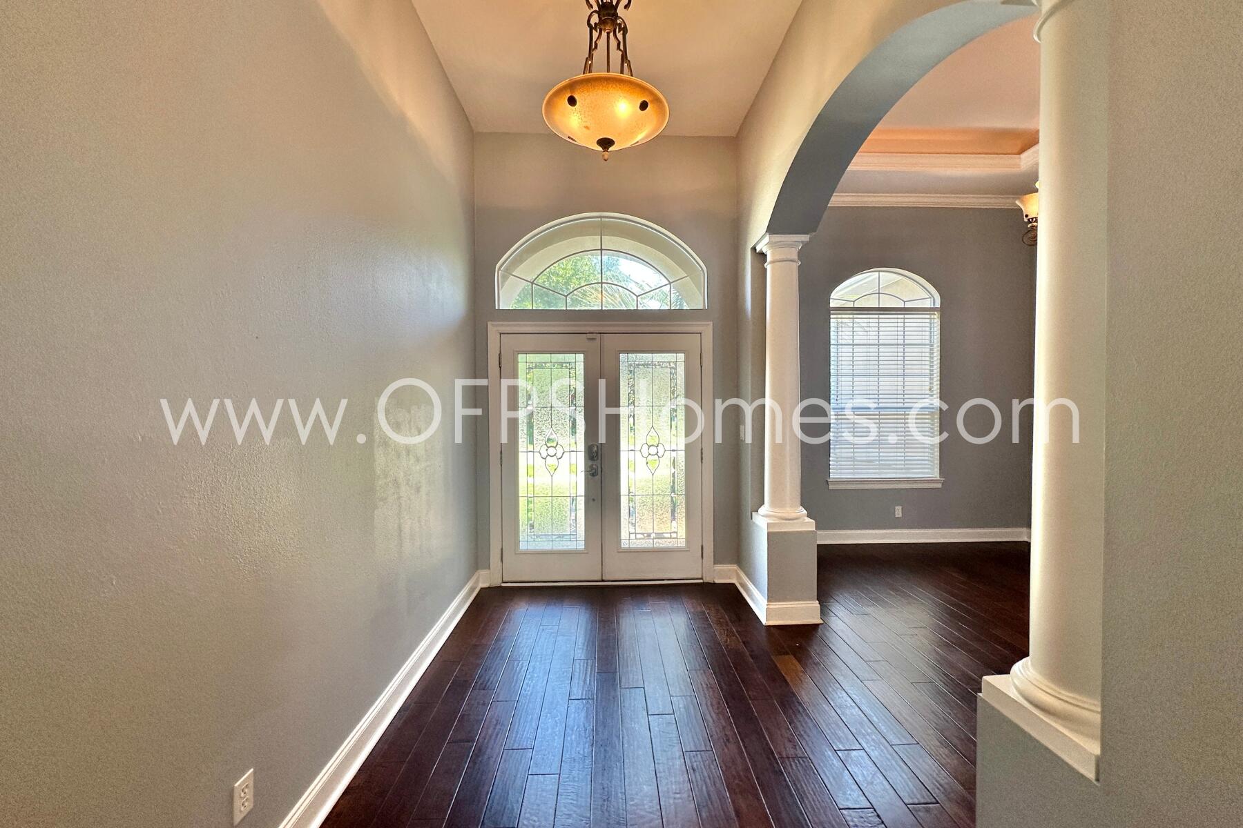 4611 Chanan Drive Crestview, FL 32539 - Photo 6 of 36 a view of entryway with wooden floor