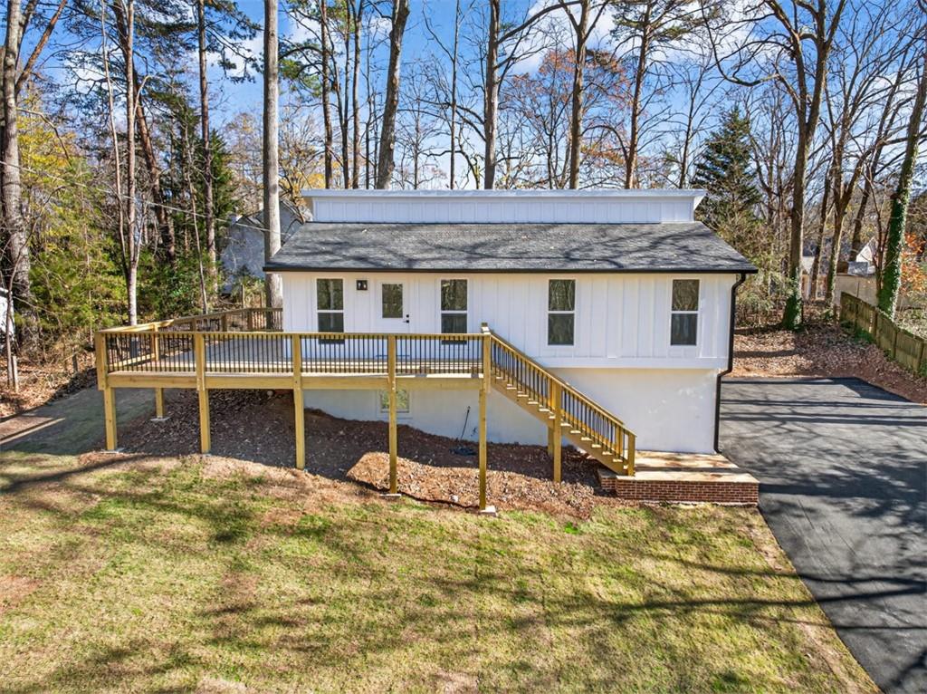 4190 Heather Way Cumming, GA 30041 - Photo 2 of 45 a house view with a outdoor space
