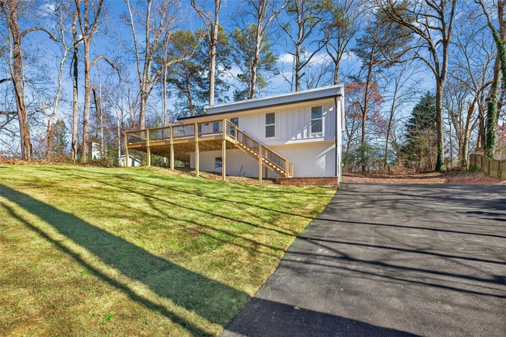 4190 Heather Way Cumming, GA 30041 - Photo 35 of 45 a view of swimming pool with a yard