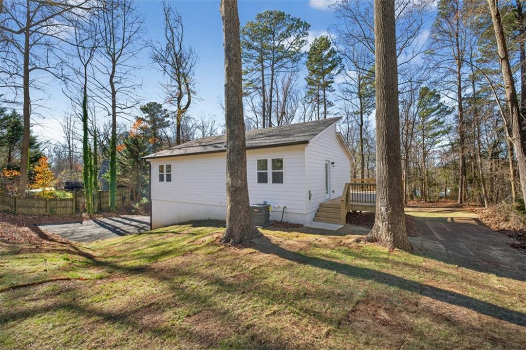4190 Heather Way Cumming, GA 30041 - Photo 36 of 45 a view of a house with snow on the road