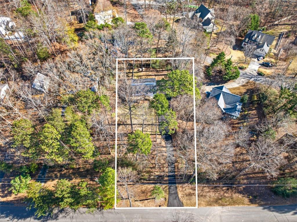 4190 Heather Way Cumming, GA 30041 - Photo 40 of 45 a picture of a door and a tree