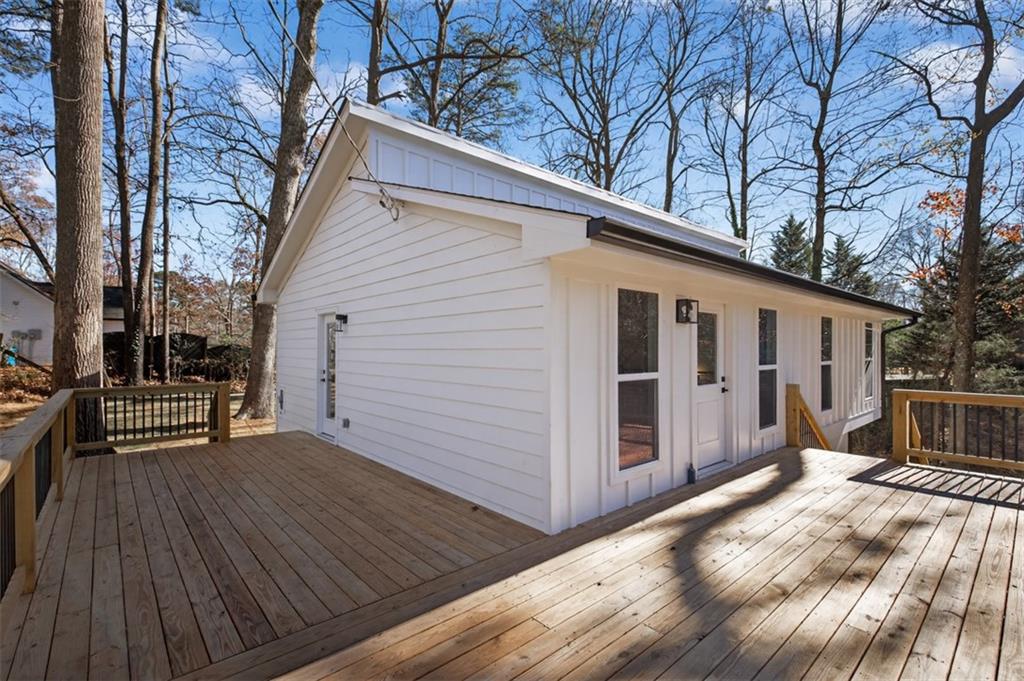 4190 Heather Way Cumming, GA 30041 - Photo 6 of 45 a view of a house with a roof deck