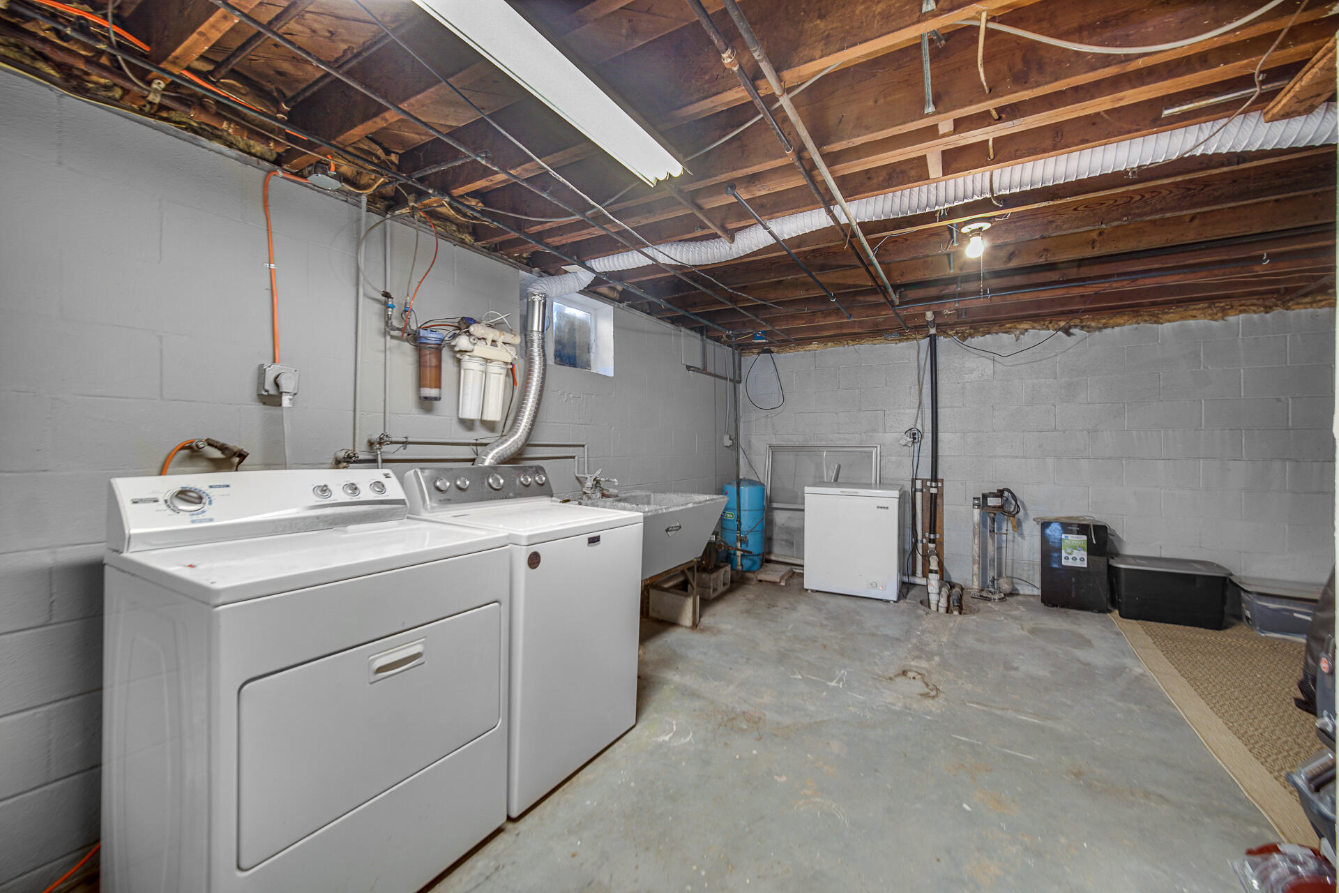 612 Almond Street Northwest De Motte, IN 46310 - Photo 23 of 27 a utility room with dryer and washer