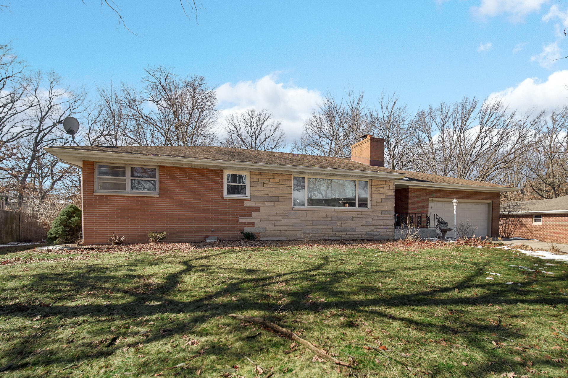 612 Almond Street Northwest De Motte, IN 46310 - Photo 25 of 27 a view of a house with a yard