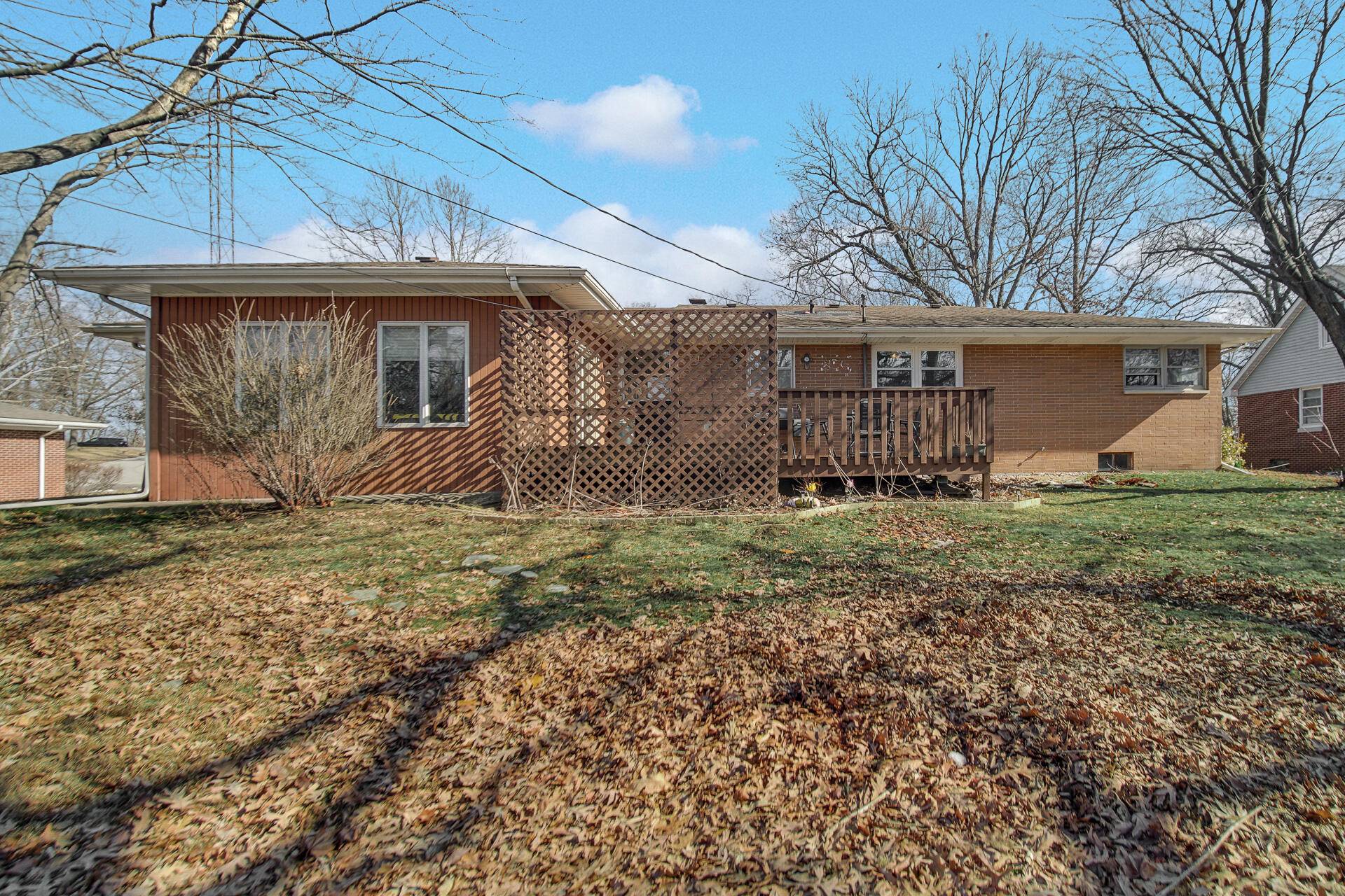 612 Almond Street Northwest De Motte, IN 46310 - Photo 26 of 27 a front view of a house with garden