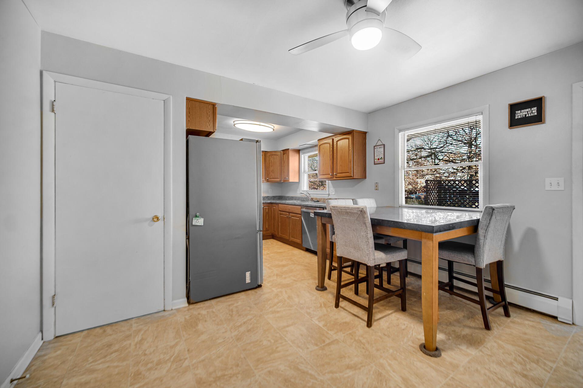 612 Almond Street Northwest De Motte, IN 46310 - Photo 6 of 27 a view of a dining room with furniture