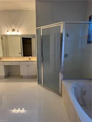 a bathroom with a toilet and a sink