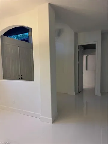 a utility room with faucet dryer and washer