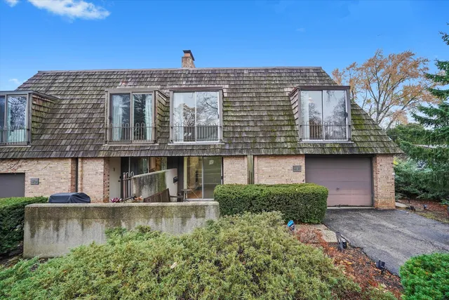 a view of a building with a garden