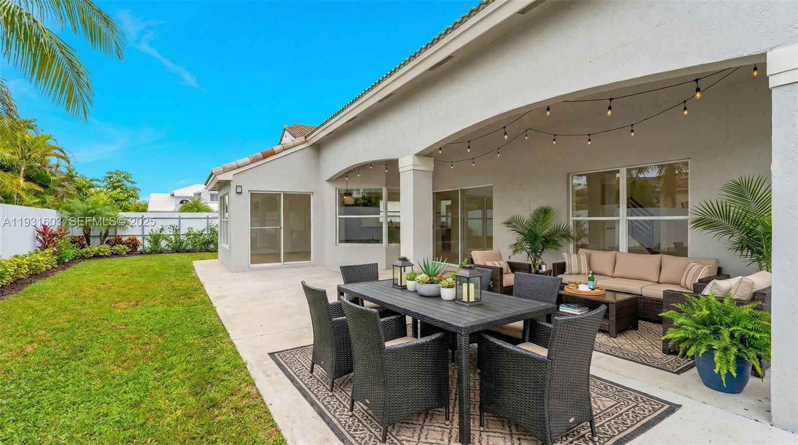 16054 Southwest 77th Terrace Miami, FL 33193 - Photo 36 of 42 a view of a house with backyard and sitting area