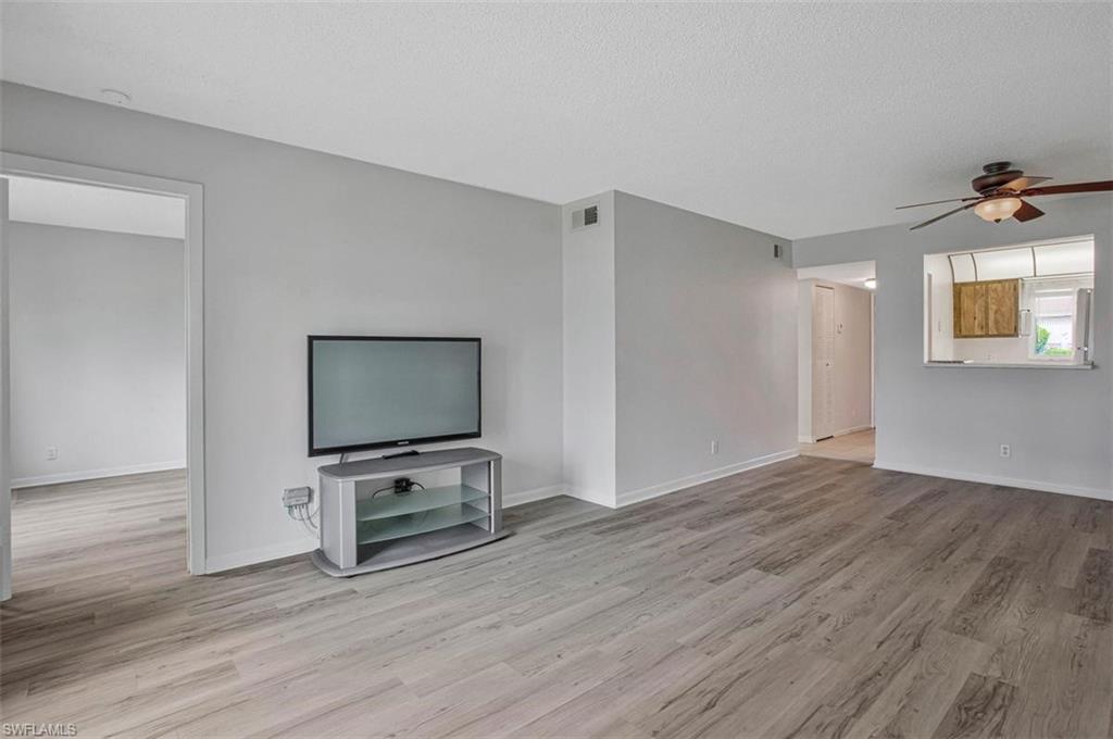 4306 27th Court Southwest, Unit 102 Naples, FL 34116 - Photo 2 of 20