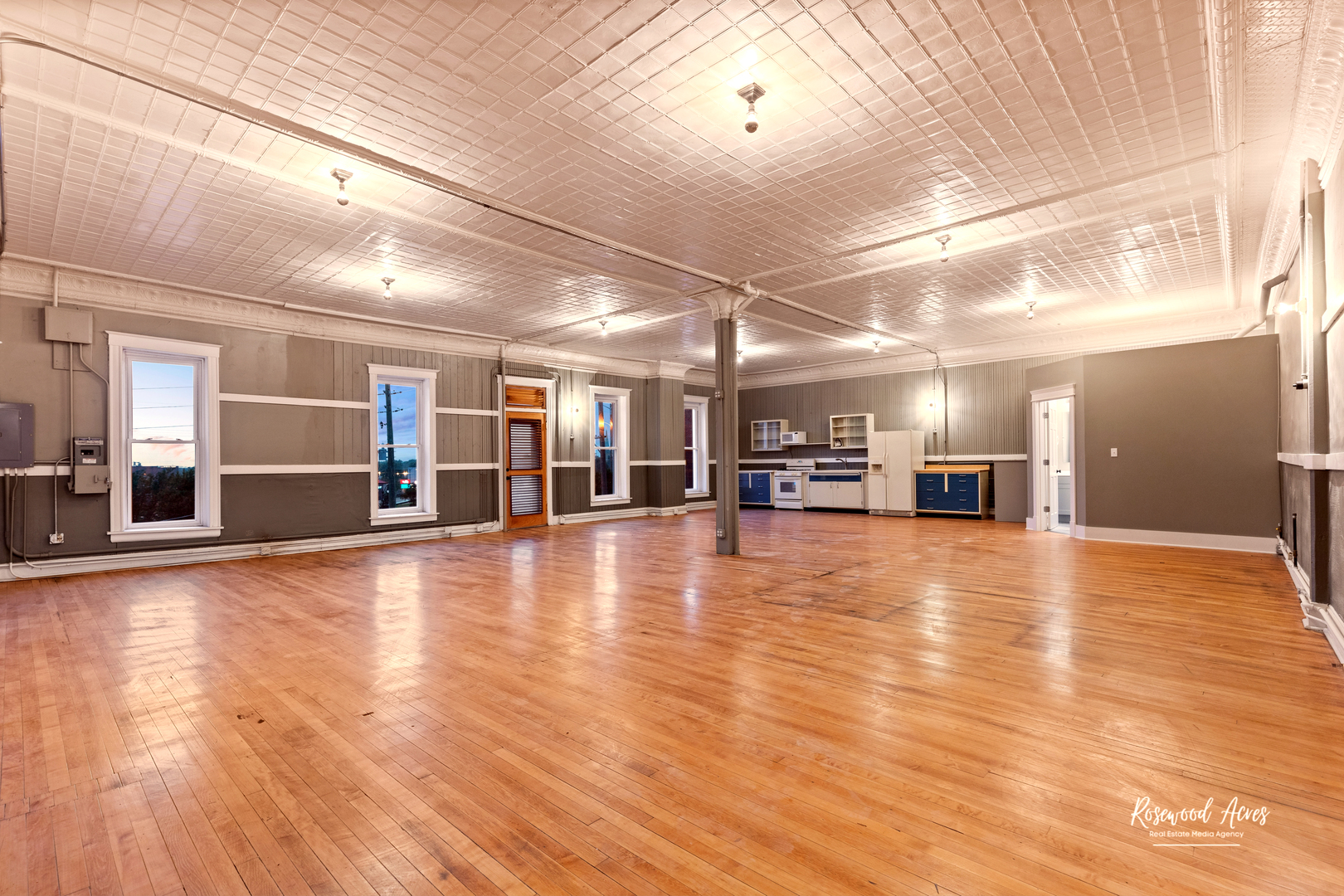 169 South Schuyler Avenue, Unit 6 Kankakee, IL 60901 - Photo 2 of 7 a view of a kitchen with a sink and a stove