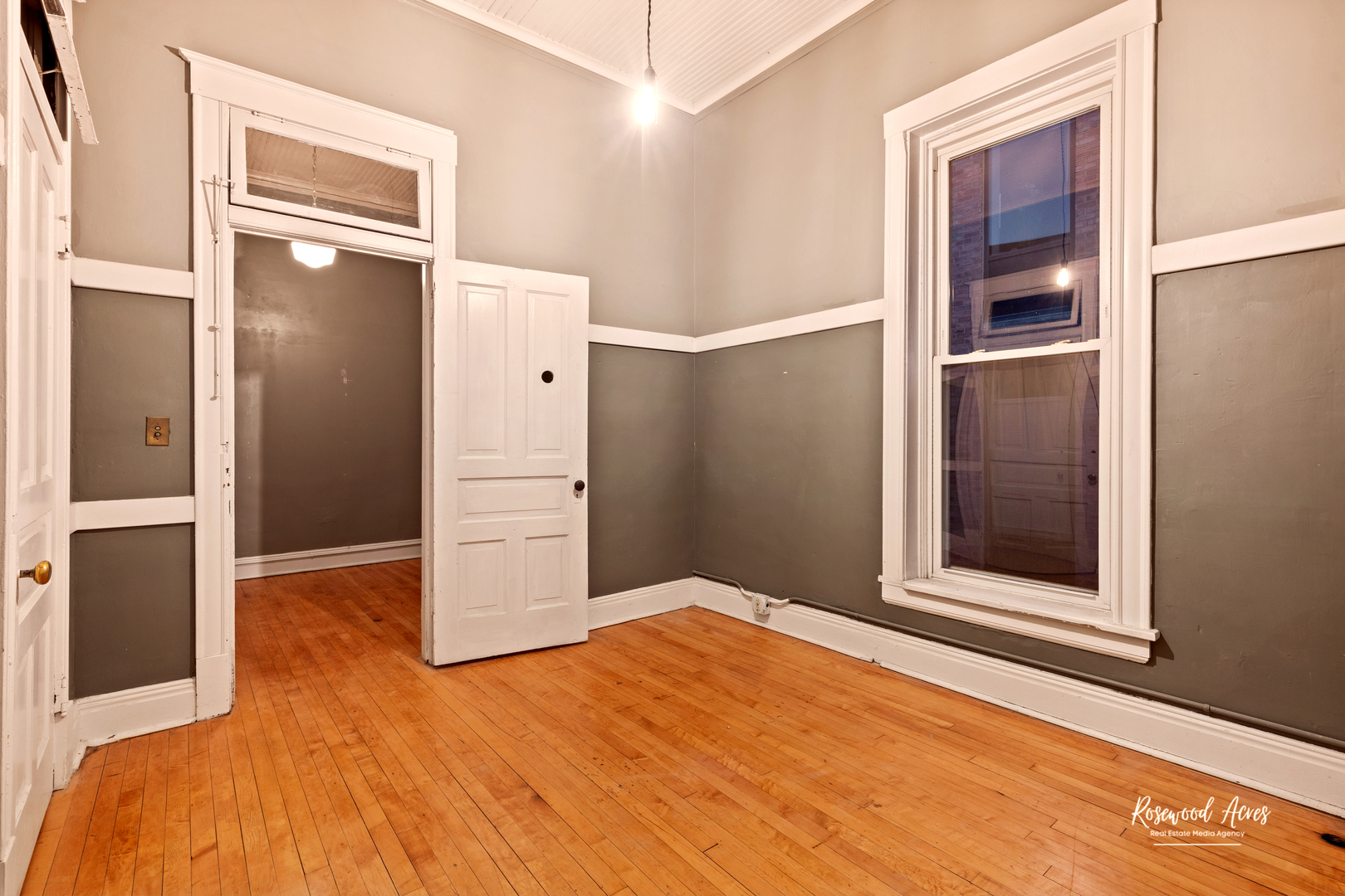 169 South Schuyler Avenue, Unit 6 Kankakee, IL 60901 - Photo 5 of 7 a view of empty room with wooden floor