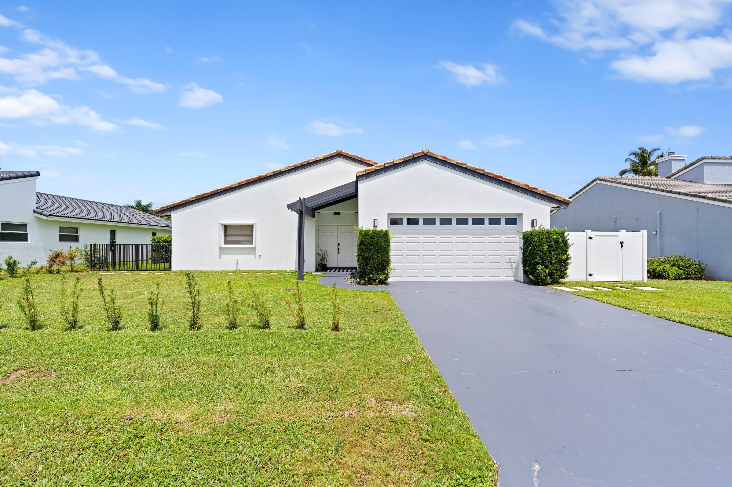 6973 Northwest 3rd Avenue Boca Raton, FL 33487 - Photo 22 of 37 2 Car Garage