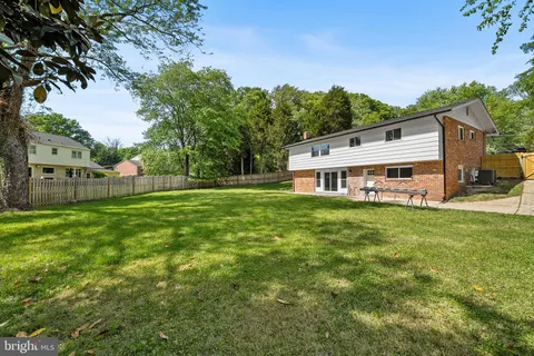 a view of a house with a big yard