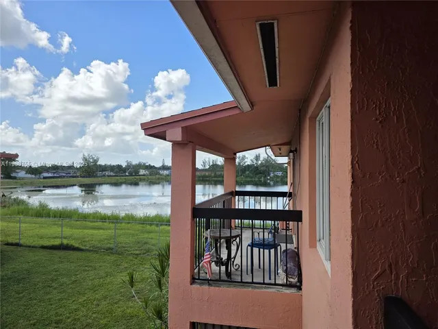 a view of a lake from a balcony