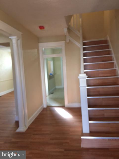 418 Edgewood Street Baltimore, MD 21229 - Photo 2 of 10 a view of entryway with wooden floor