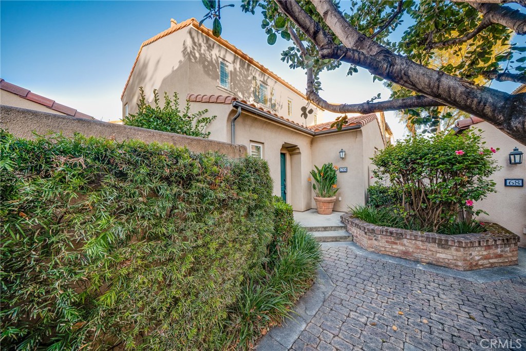 70 Latitude Irvine, CA 92618 - Photo 1 of 27 a front view of a house with garden