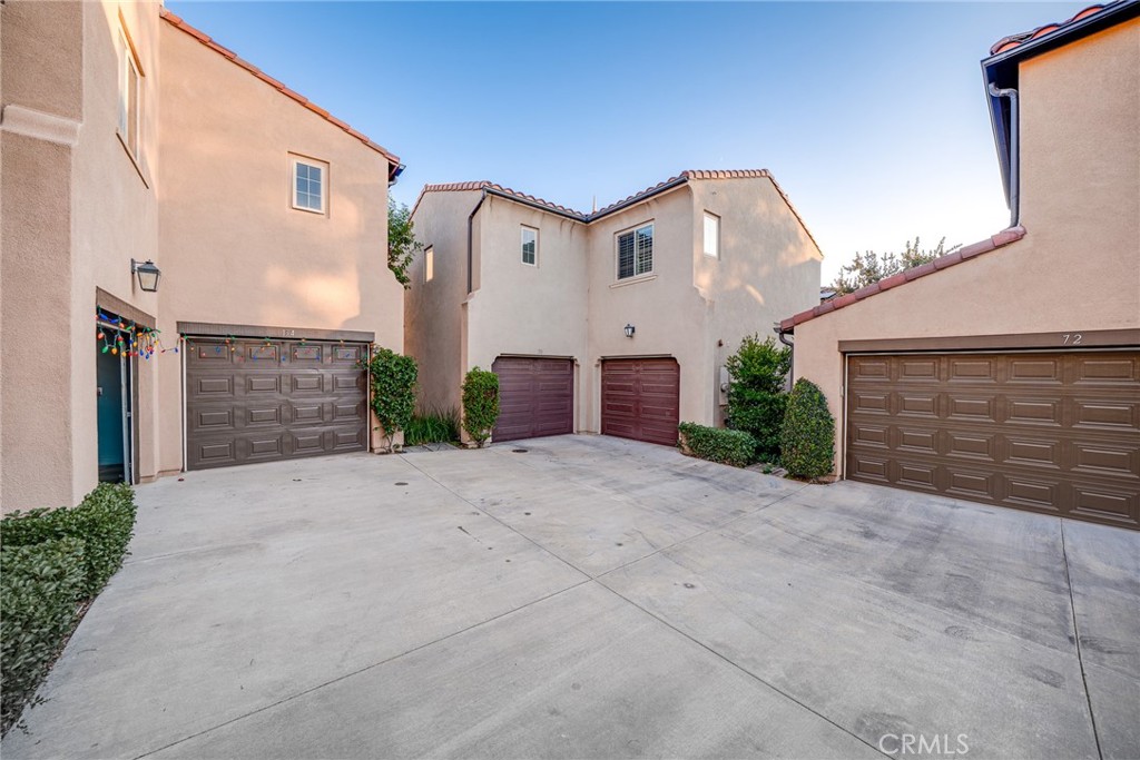 70 Latitude Irvine, CA 92618 - Photo 22 of 27 a view of a house with a yard