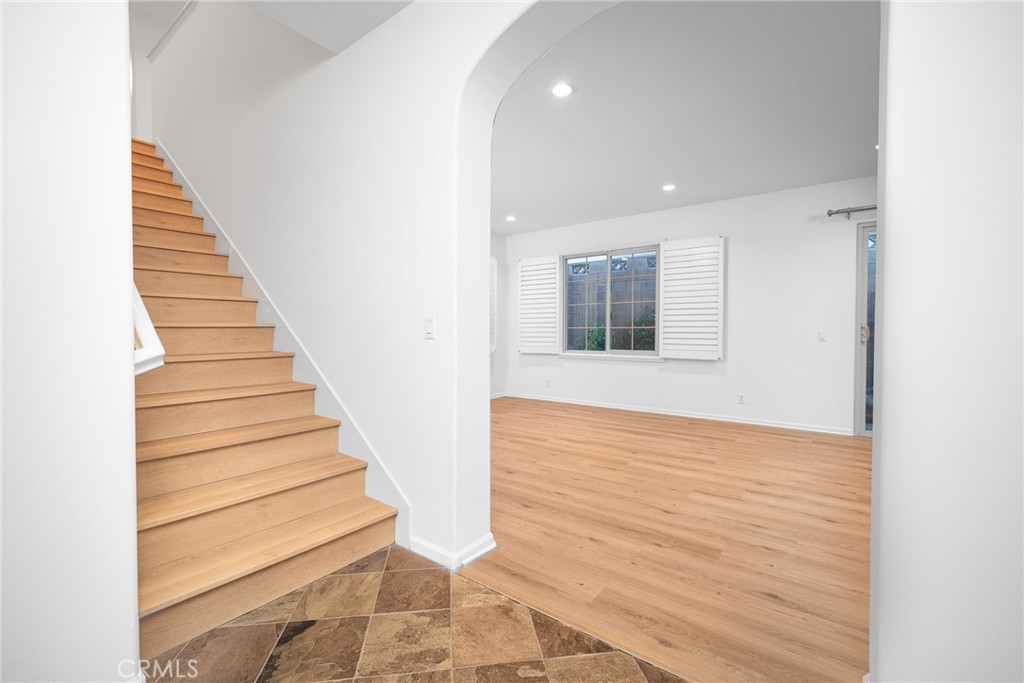 70 Latitude Irvine, CA 92618 - Photo 9 of 27 a view of an entryway with wooden floor