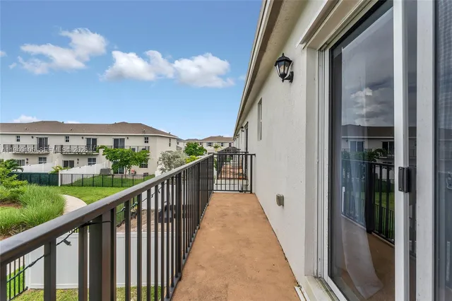 a view of a balcony with a porch