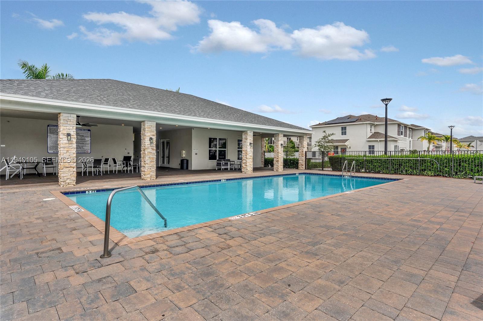 805 South E 18th Street, Unit 805 Homestead, FL 33034 - Photo 29 of 29 a view of a house with a backyard