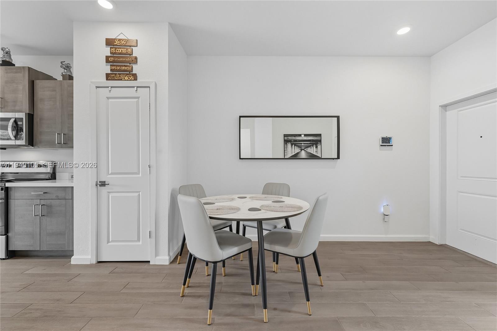 805 South E 18th Street, Unit 805 Homestead, FL 33034 - Photo 5 of 29 a dining room with furniture and window