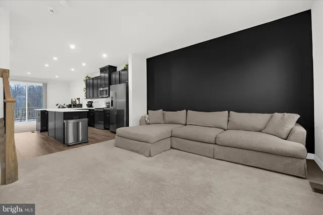 a living room with a couch and a flat screen tv