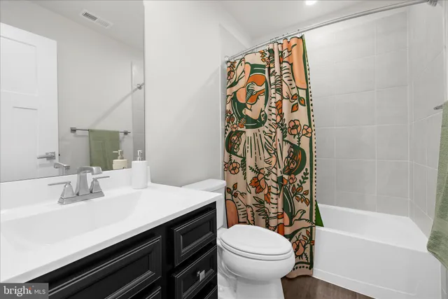 a view of staircase with white walls