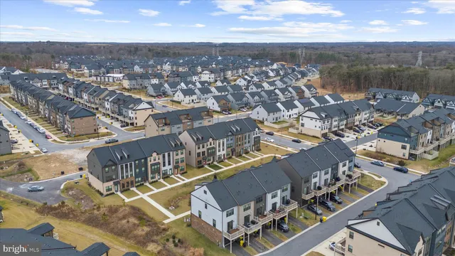 an aerial view of residential building with parking space