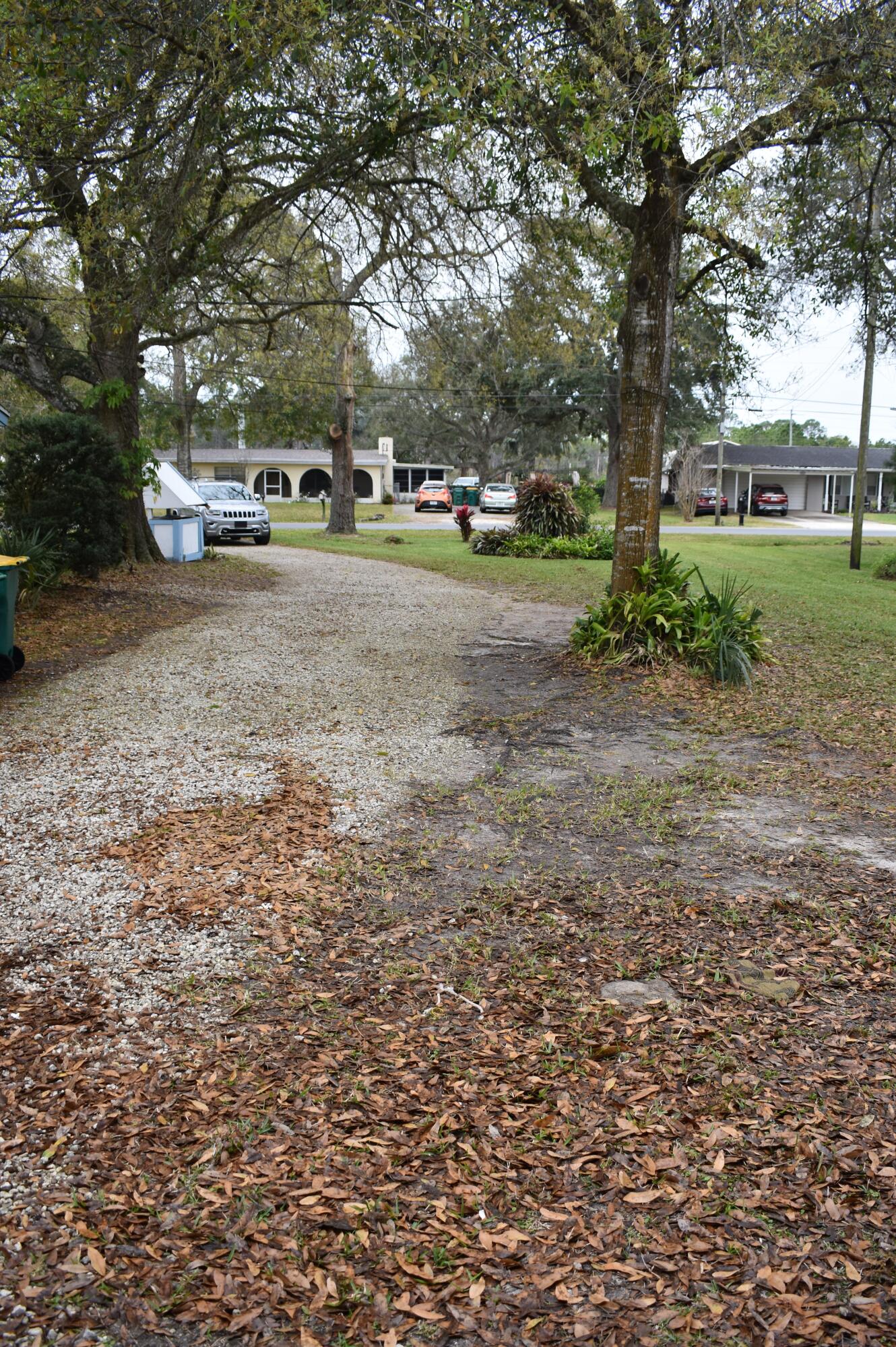 1812 Pinewood Road Melbourne, FL 32934 - Photo 27 of 31 a view of street with parked cars