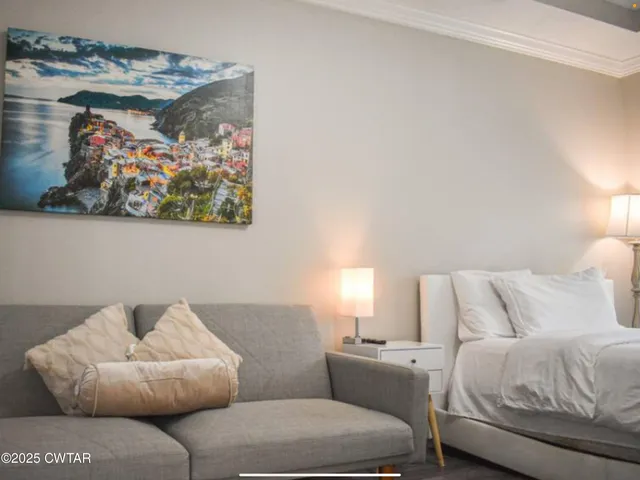 a living room with furniture and a couch