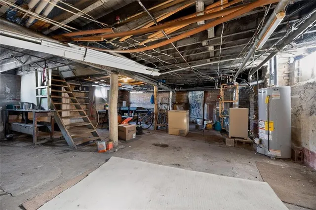 a view of empty room with wooden ceiling