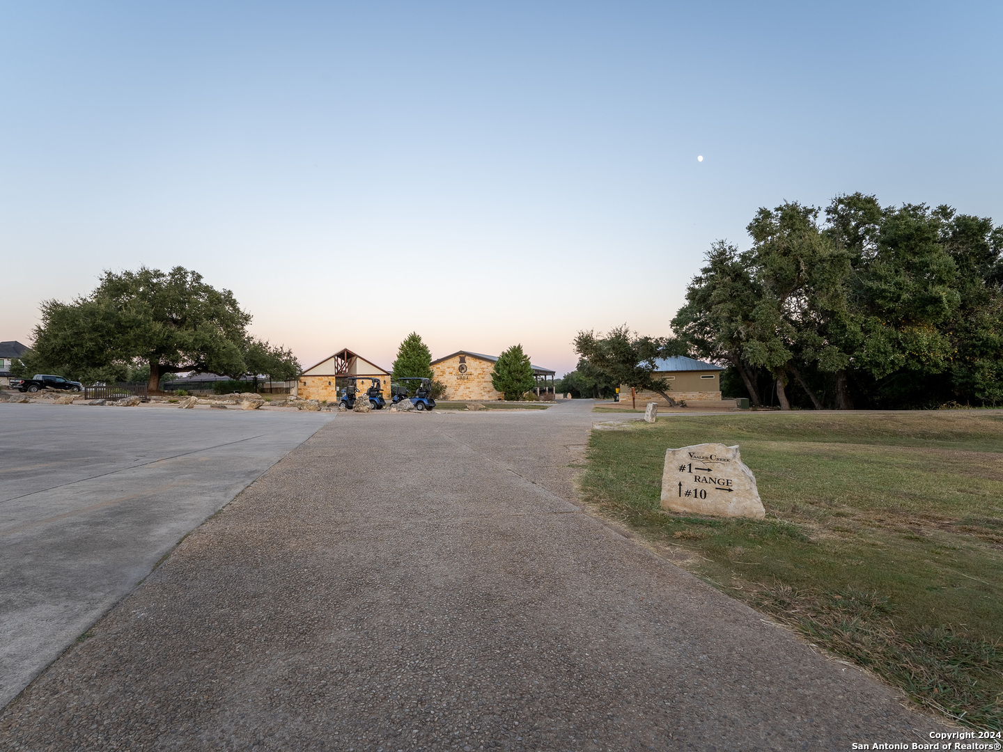 209 North Calvin Barrett Blanco, TX 78606 - Photo 5 of 11 a view of a field of grass and trees