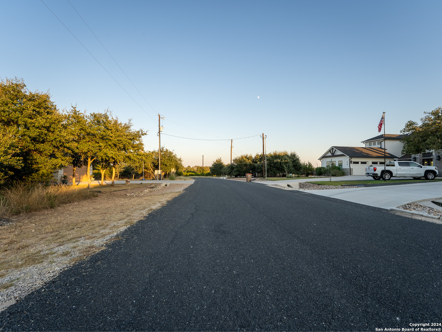 209 North Calvin Barrett Blanco, TX 78606 - Photo 7 of 11 a car parked on the side of the road