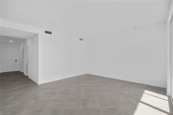 an empty room with an entryway