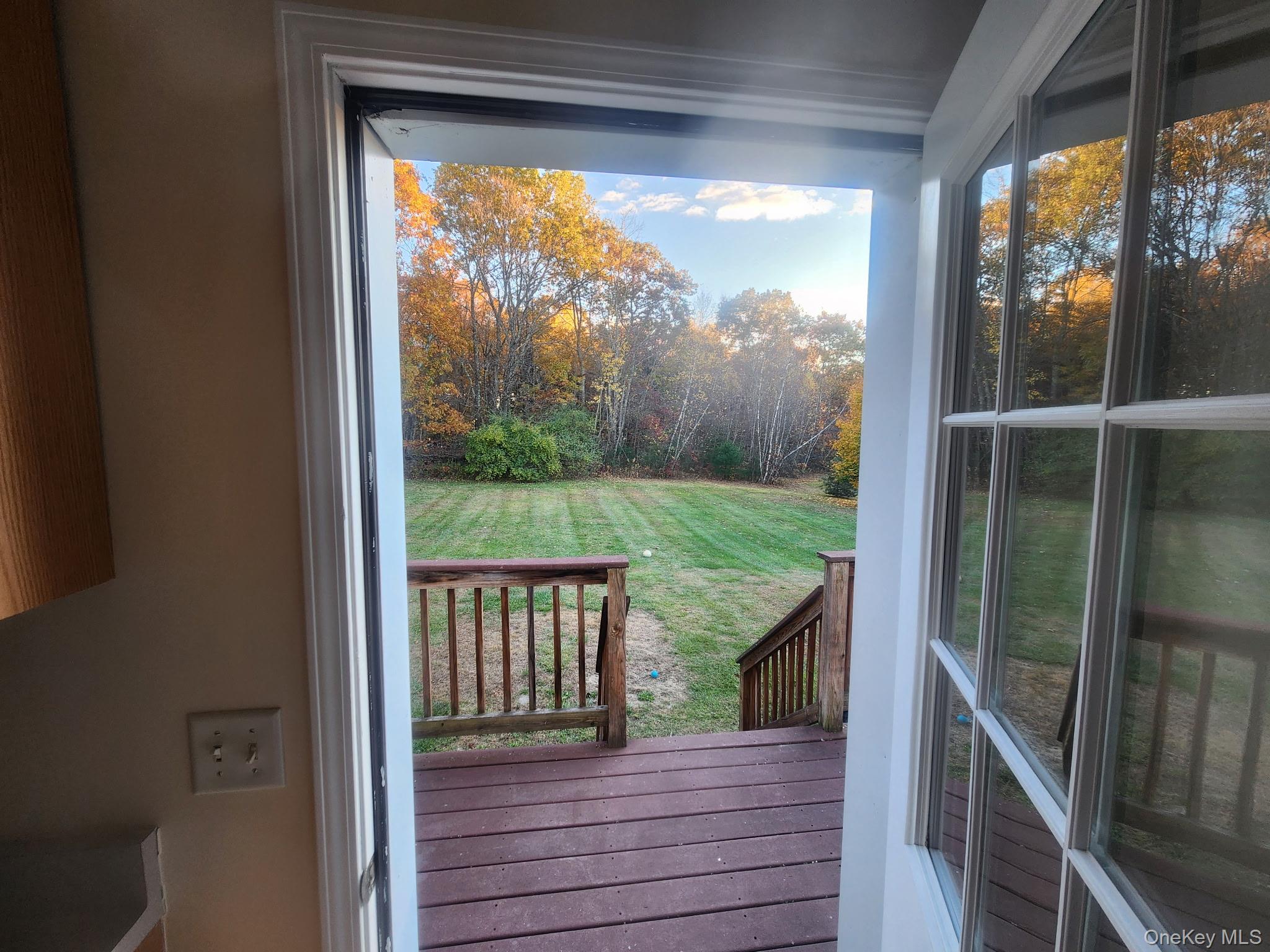 698 South Street, Unit 2 Highland, NY 12528 - Photo 3 of 16 a view of a balcony with wooden floor and outdoor space