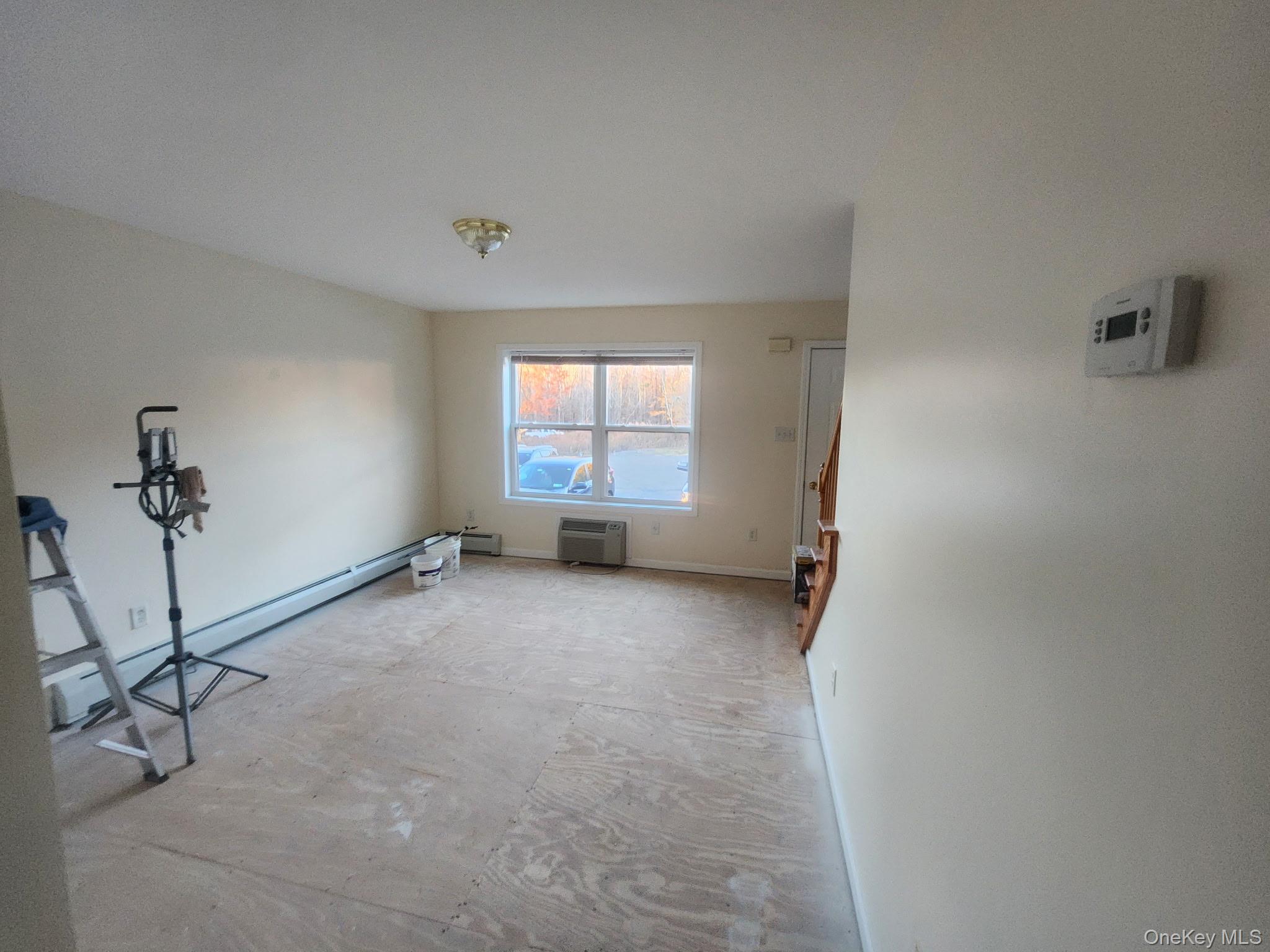 698 South Street, Unit 2 Highland, NY 12528 - Photo 4 of 16 a view of a livingroom with a staircase